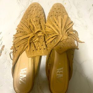 Tan loafer with tassels